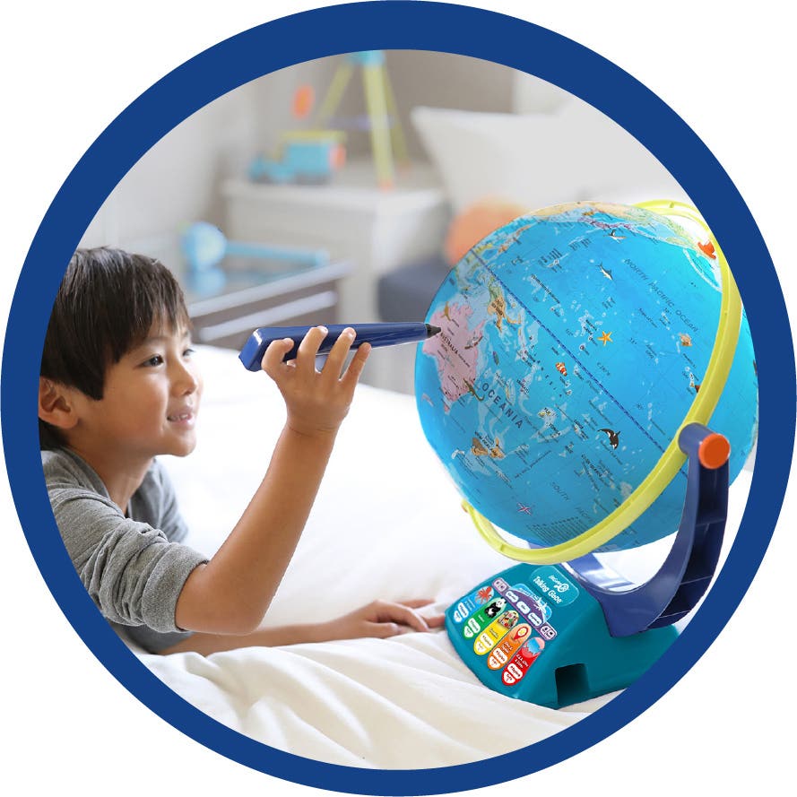 Boy using  the Learning Resources Puzzle Globe